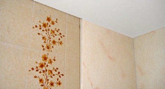 bathroom cladding installed over tiles
